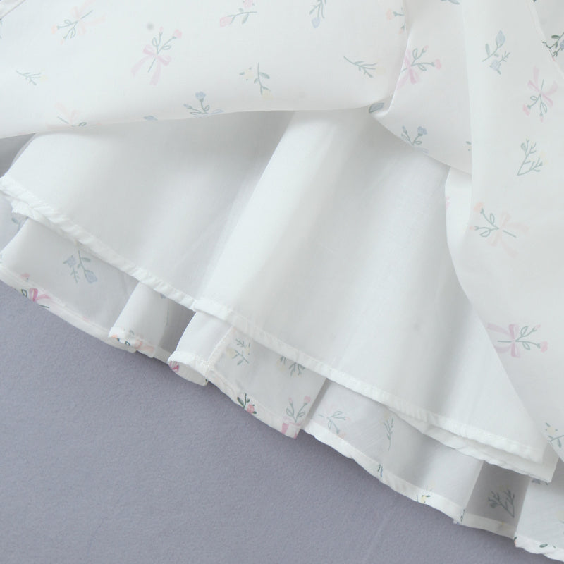 שמלת מיני בגזרת A בעיטור כפתורים וקשירה בחזה - מרום