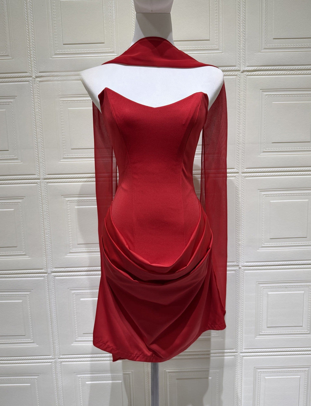 GENNA strapless satin mini dress with pleats, a tie-up corset at the back for a fitted waist, and a scarf detail