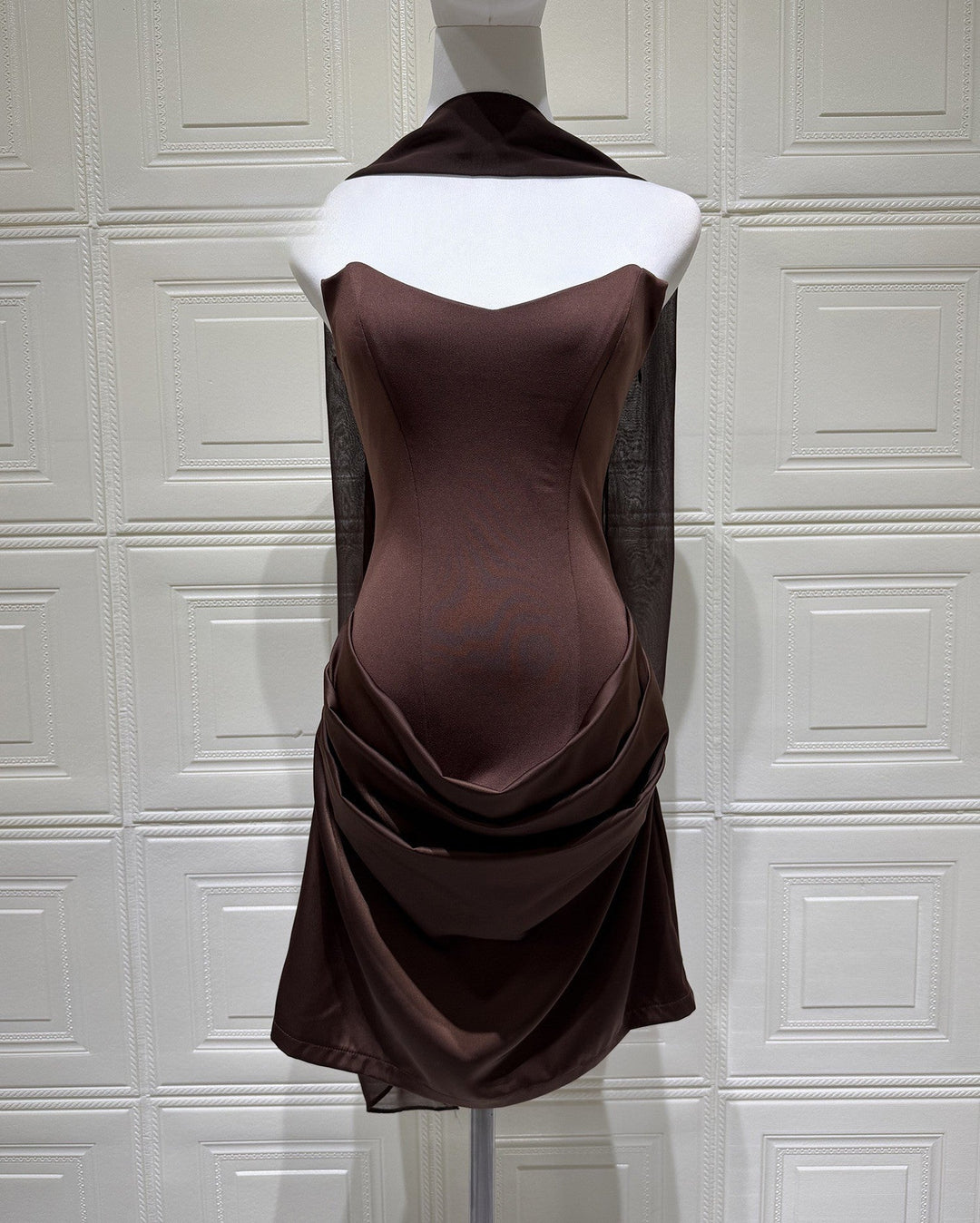 GENNA strapless satin mini dress with pleats, a tie-up corset at the back for a fitted waist, and a scarf detail
