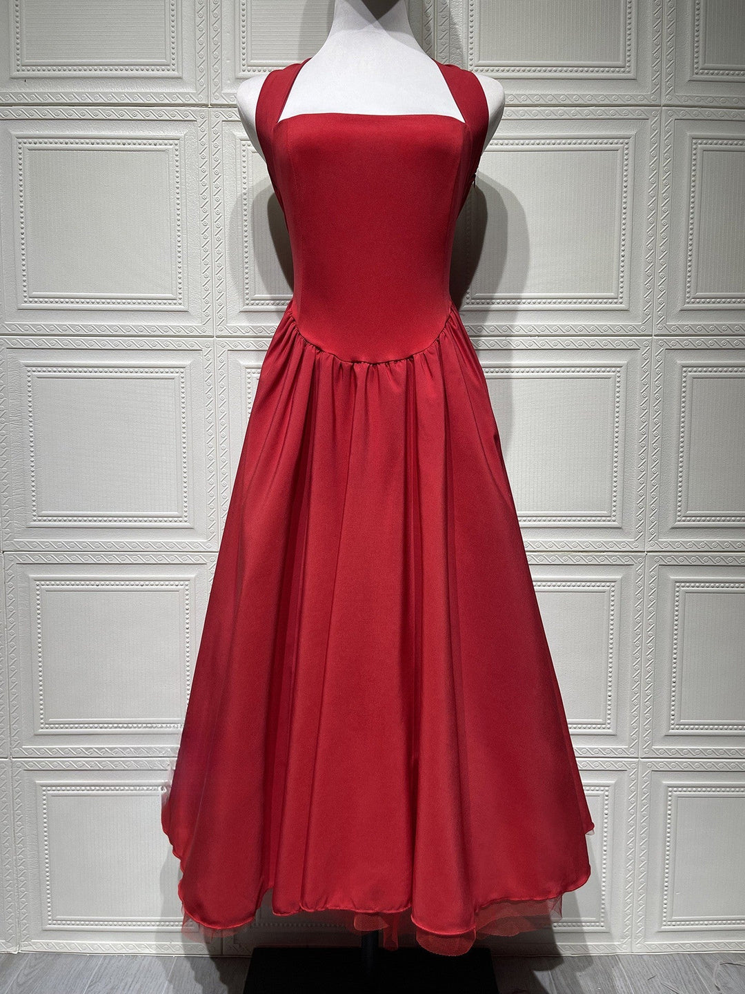 Marlene midi dress with a neck tie, open back, and tulle trim