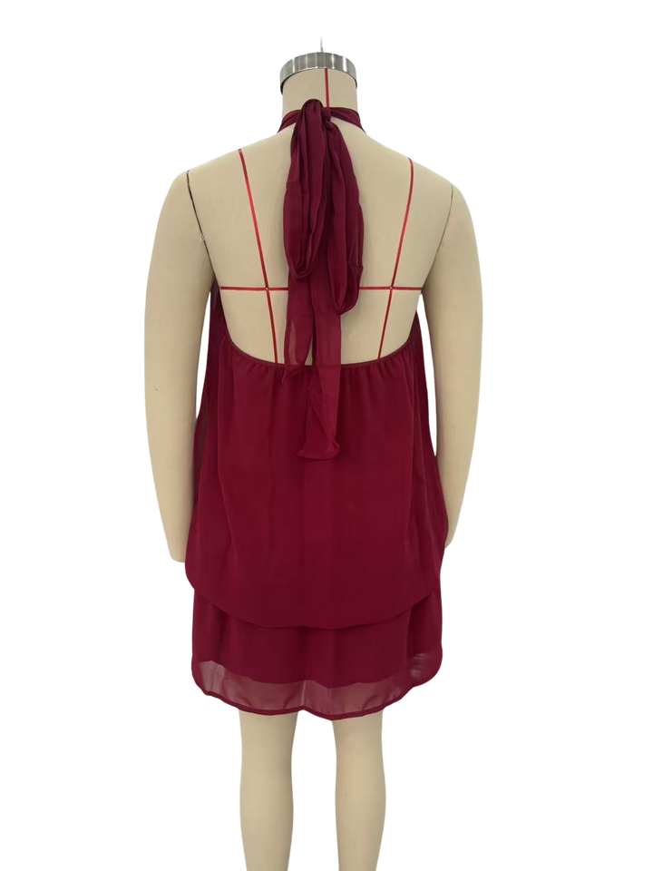 Chiffon ruffled mini dress with tiered ruffles, neck tie, and open back – Seychelles
