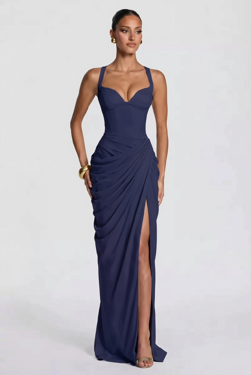Layla maxi dress with a slit, pleats, corset design, back tie, and waist-cinching fit