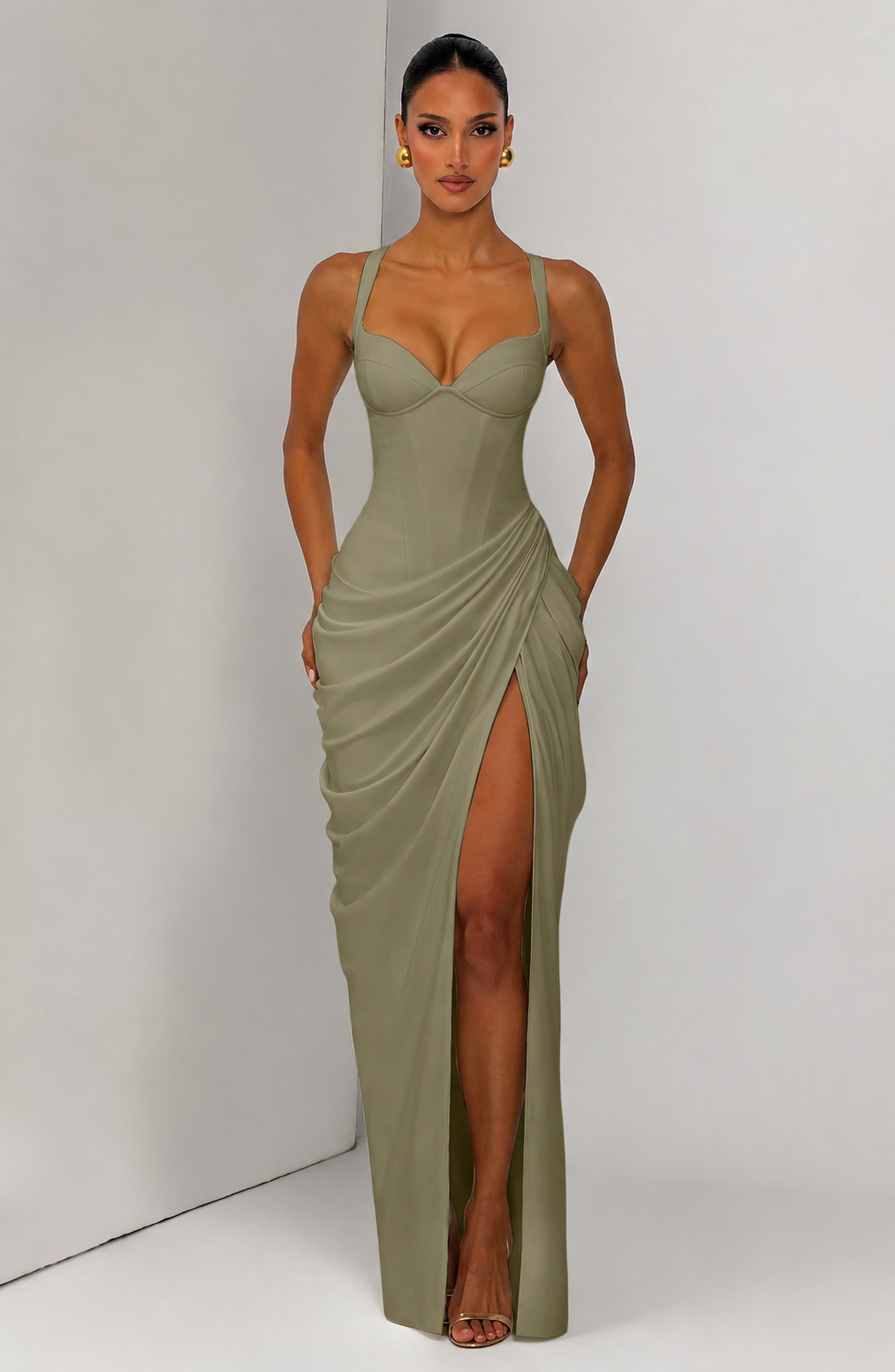 Layla maxi dress with a slit, pleats, corset design, back tie, and waist-cinching fit