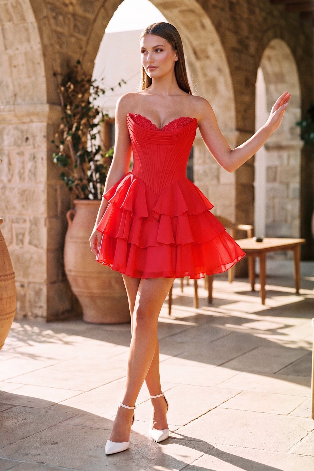 SHERY strapless mini dress with tiered ruffles, corset design, back tie, and waist-cinching fit