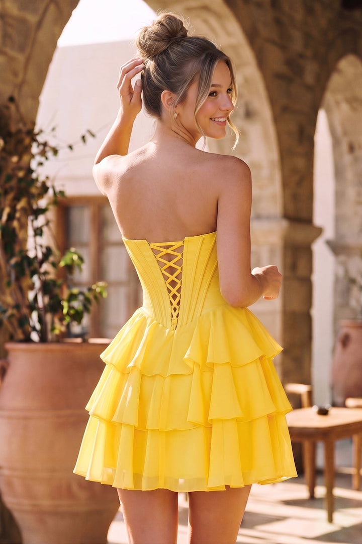 SHERY strapless mini dress with tiered ruffles, corset design, back tie, and waist-cinching fit