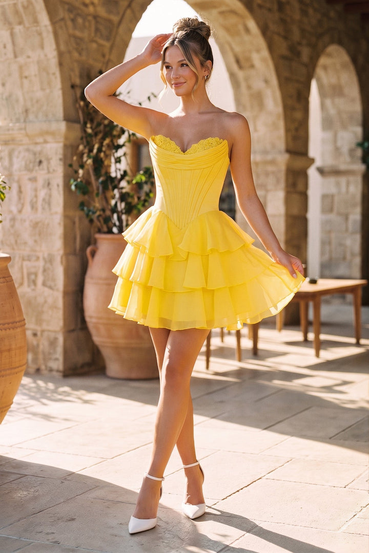 SHERY strapless mini dress with tiered ruffles, corset design, back tie, and waist-cinching fit