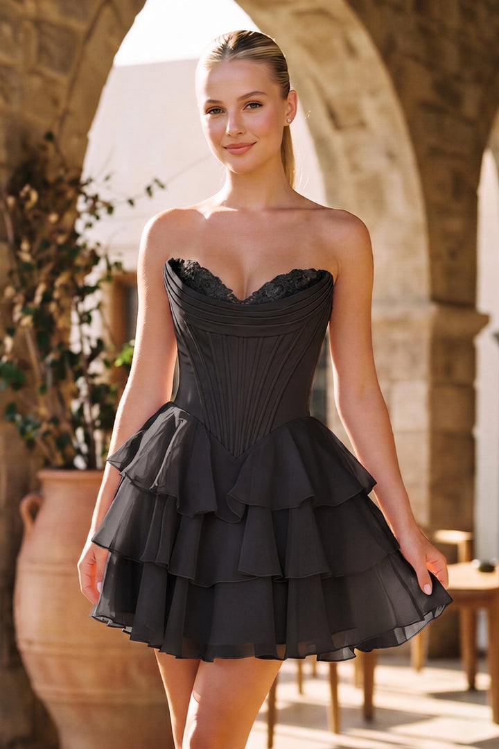 SHERY strapless mini dress with tiered ruffles, corset design, back tie, and waist-cinching fit