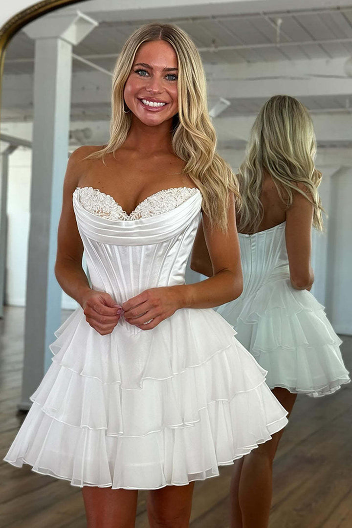 SHERY strapless mini dress with tiered ruffles, corset design, back tie, and waist-cinching fit