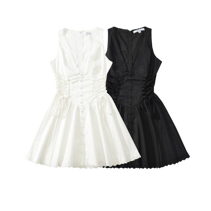 A-line mini dress with tie and button embellishments – Vanessa