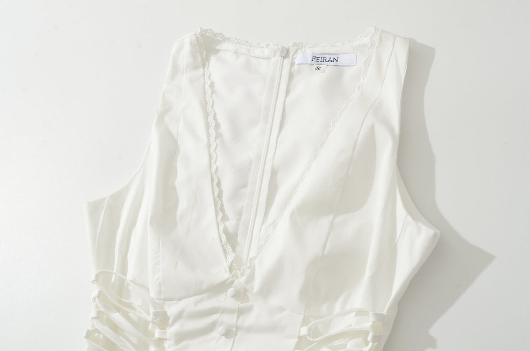 A-line mini dress with tie and button embellishments – Vanessa