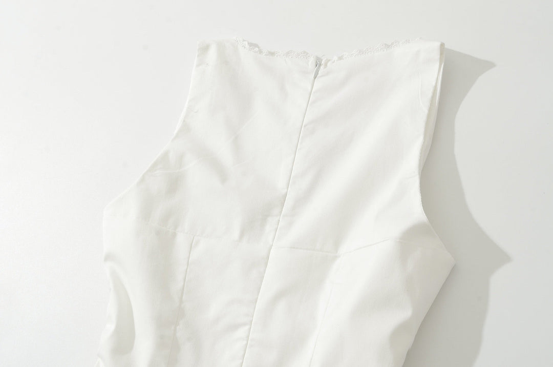 A-line mini dress with tie and button embellishments – Vanessa
