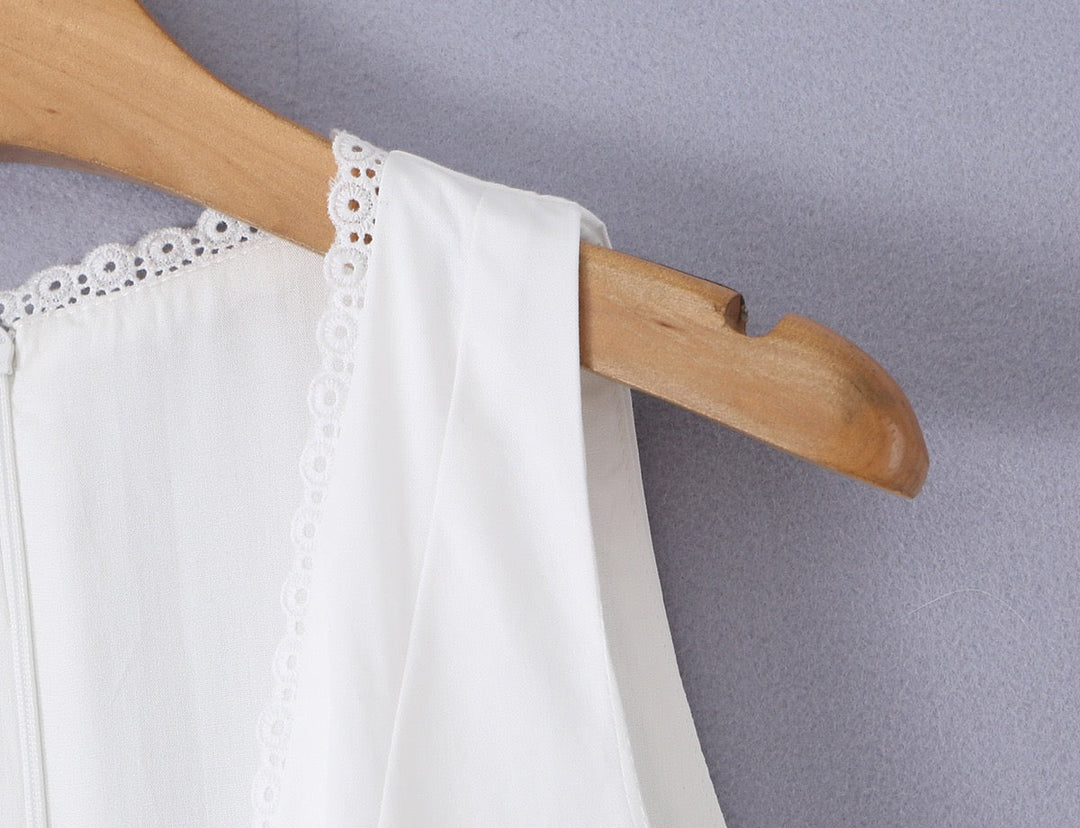A-line mini dress with tie and button embellishments – Vanessa
