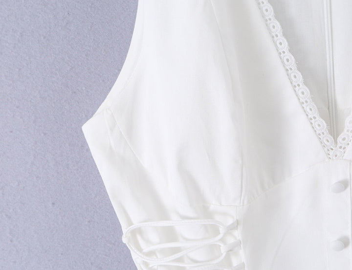 A-line mini dress with tie and button embellishments – Vanessa