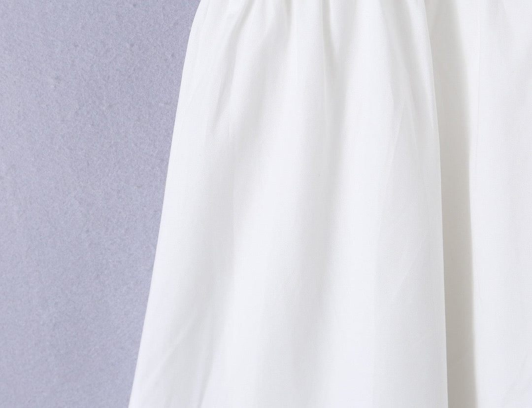 A-line mini dress with tie and button embellishments – Vanessa
