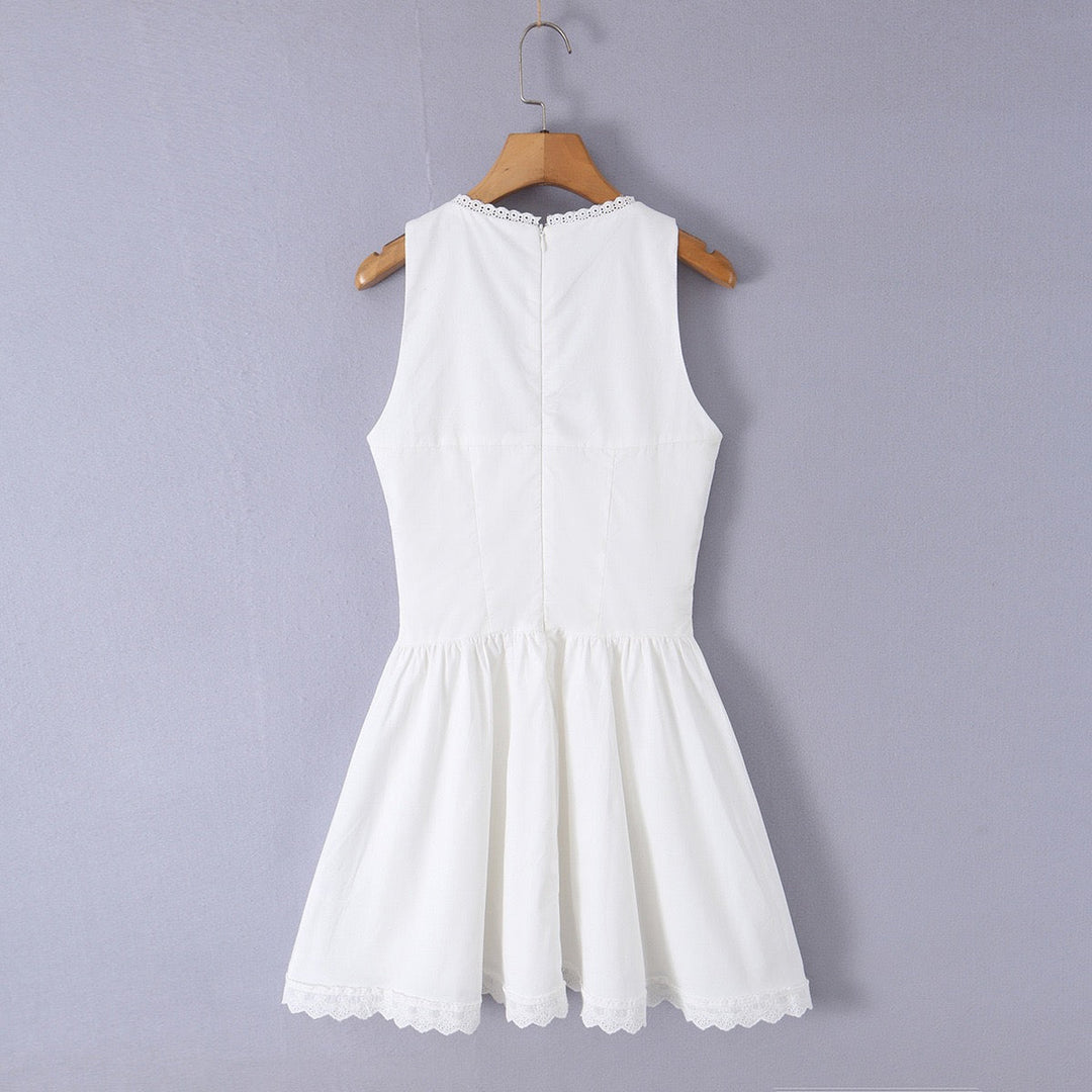 A-line mini dress with tie and button embellishments – Vanessa