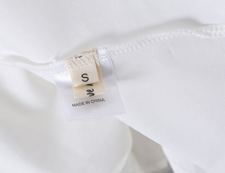 A-line mini dress with tie and button embellishments – Vanessa
