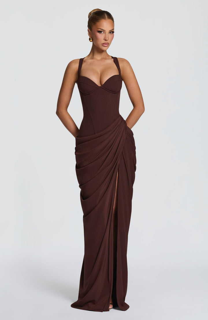 Layla maxi dress with a slit, pleats, corset design, back tie, and waist-cinching fit