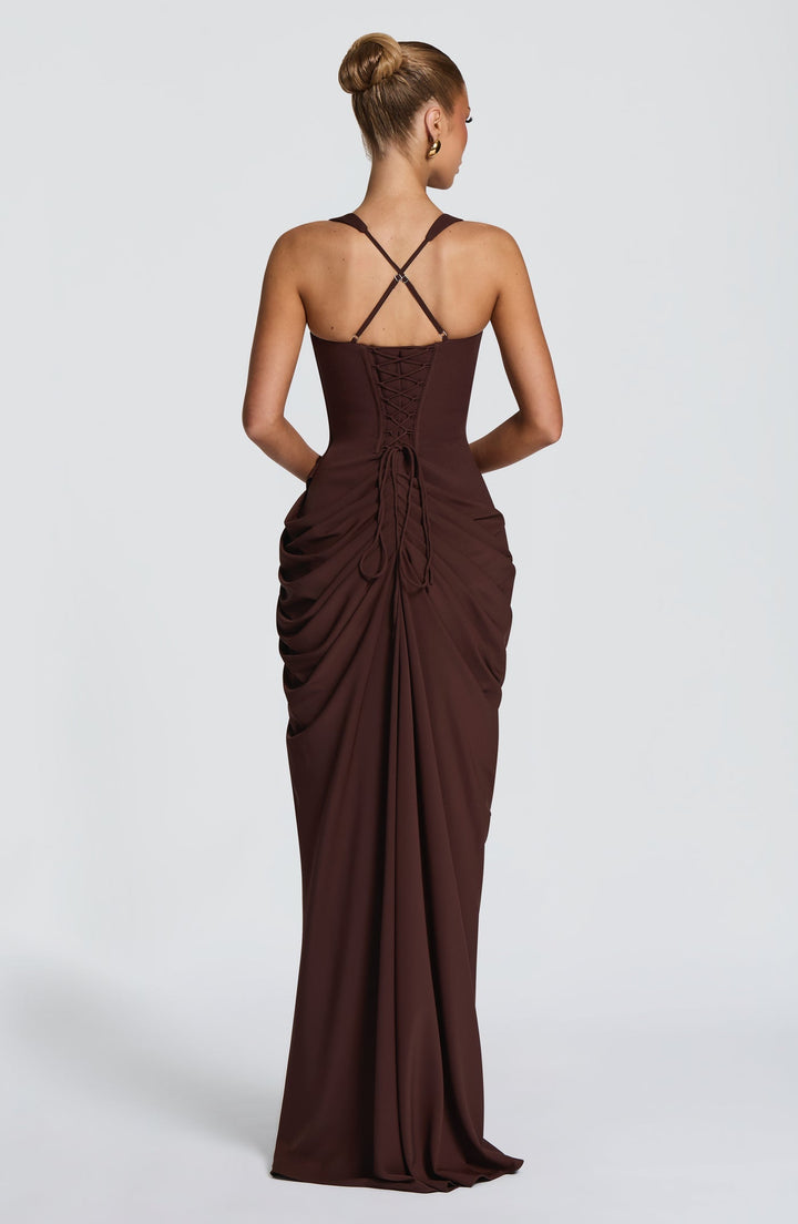 Layla maxi dress with a slit, pleats, corset design, back tie, and waist-cinching fit