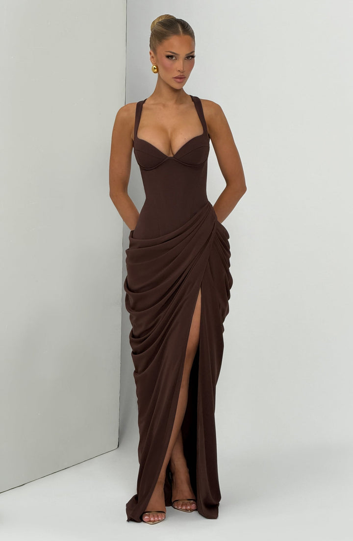 Layla maxi dress with a slit, pleats, corset design, back tie, and waist-cinching fit