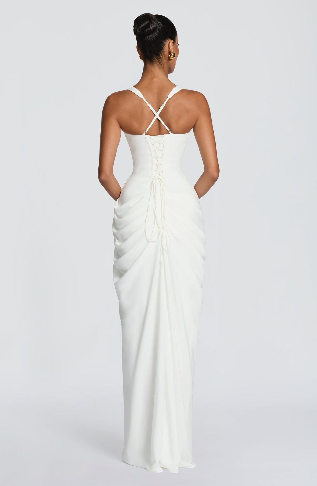 Layla maxi dress with a slit, pleats, corset design, back tie, and waist-cinching fit