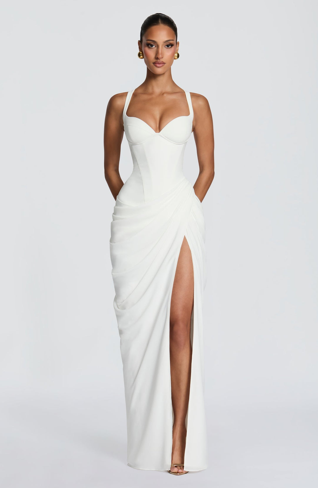 Layla maxi dress with a slit, pleats, corset design, back tie, and waist-cinching fit