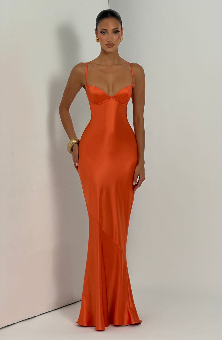 Alaia satin maxi dress with a back tie and waist-cinching design