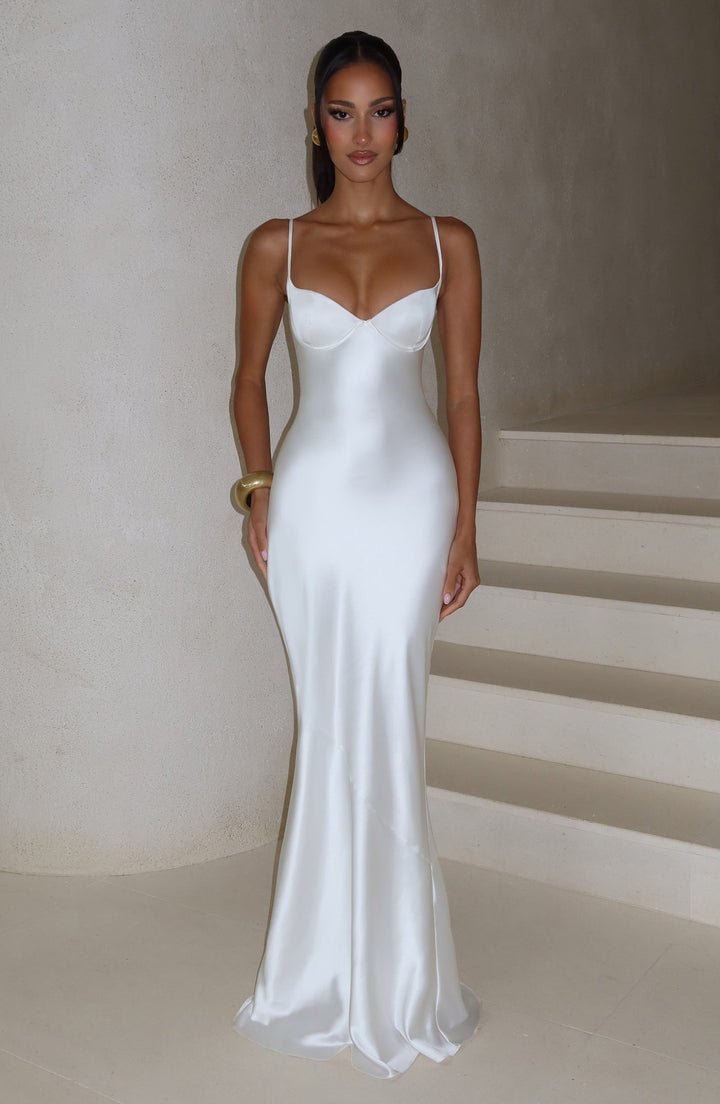 Alaia satin maxi dress with a back tie and waist-cinching design