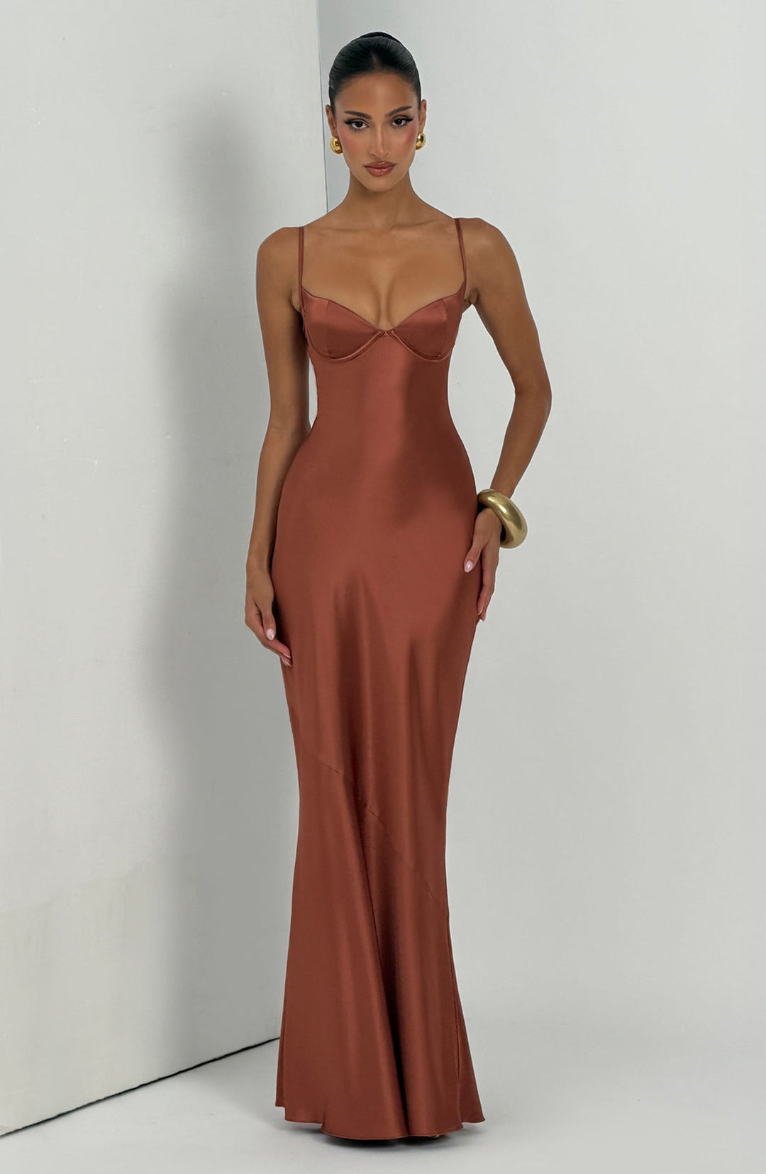 Alaia satin maxi dress with a back tie and waist-cinching design