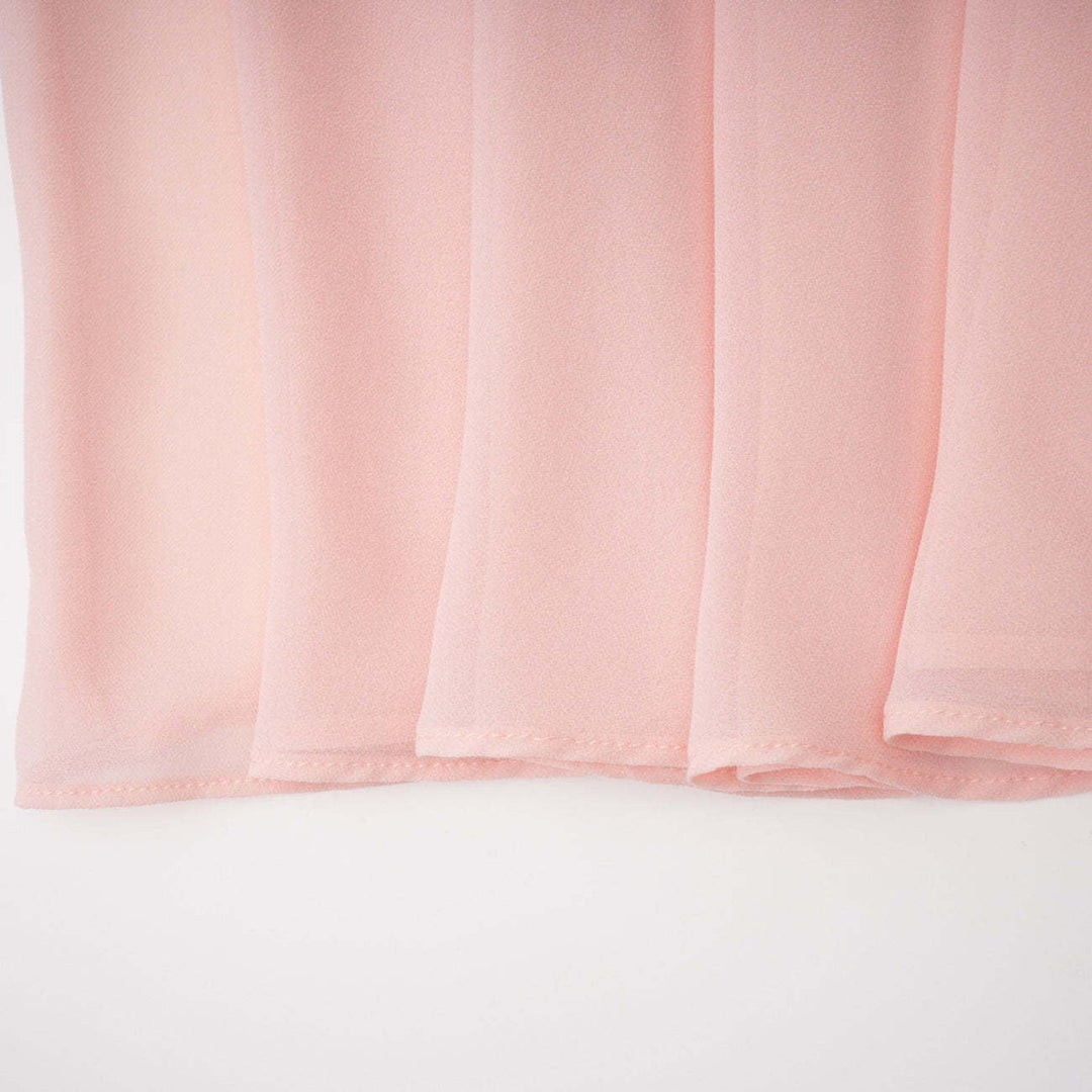 Maxi dress with a back tie for a cinched waist, chiffon skirt, and satin embellishments – Kaia