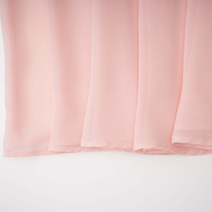 Maxi dress with a back tie for a cinched waist, chiffon skirt, and satin embellishments – Kaia