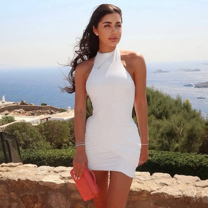 Open back halter mini dress with cross pleats design - Shelly