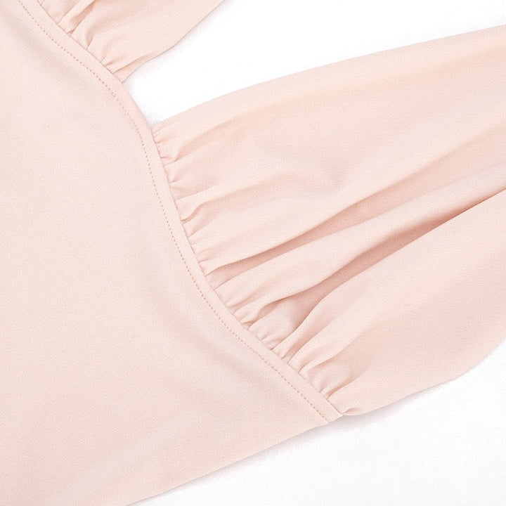 Pleated mini dress with an open back – SEAN
