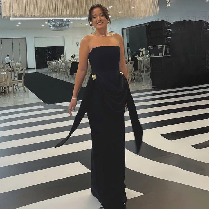 Strapless maxi dress with corset design and pleats decorated with tassels - Fleece