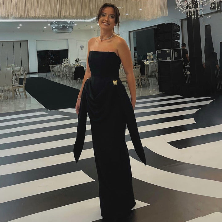 Strapless maxi dress with corset design and pleats decorated with tassels - Fleece