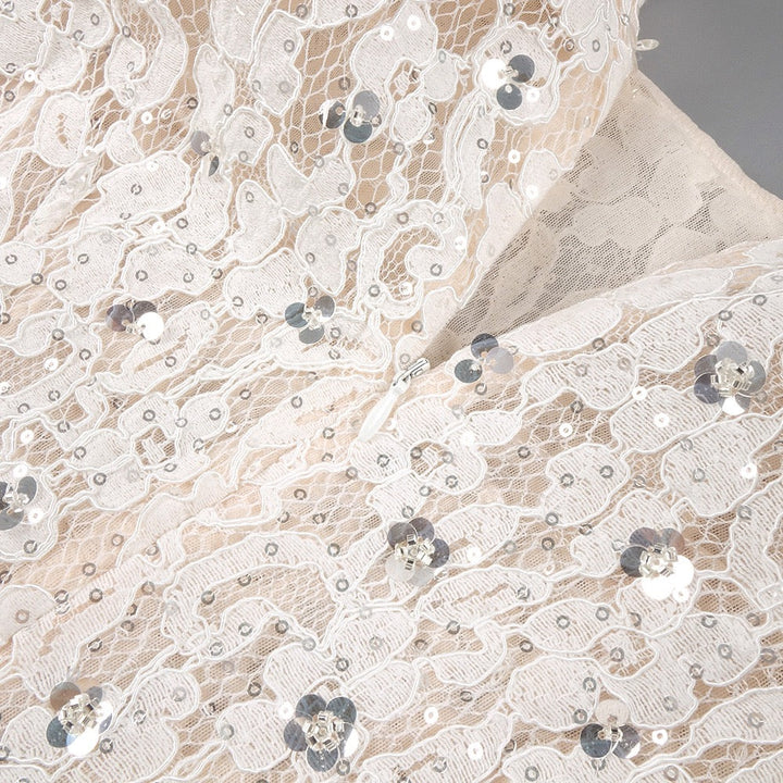 Lace mini dress with sequin and rhinestone embellishments and a chiffon train - MAXIMA