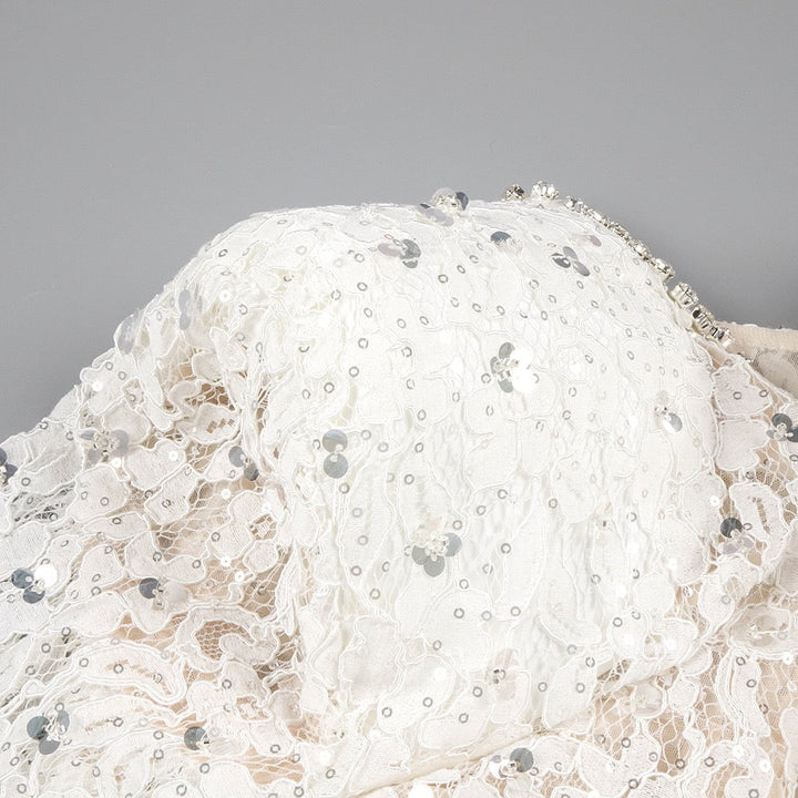 Lace mini dress with sequin and rhinestone embellishments and a chiffon train - MAXIMA
