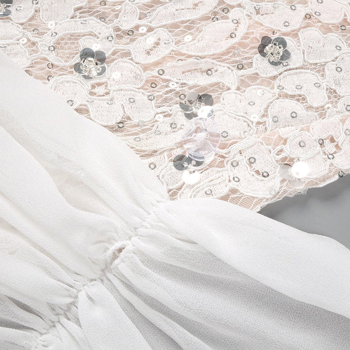 Lace mini dress with sequin and rhinestone embellishments and a chiffon train - MAXIMA