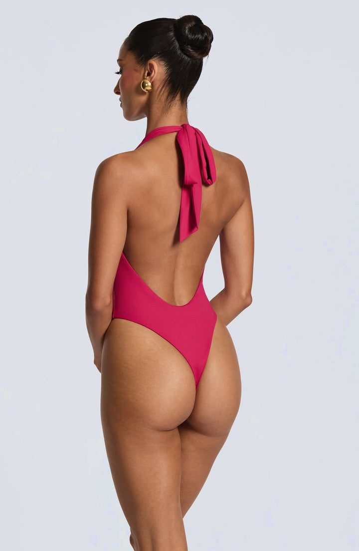 Lorenza - Two-piece set with a halter-tie bodysuit, open back, and asymmetrical skirt