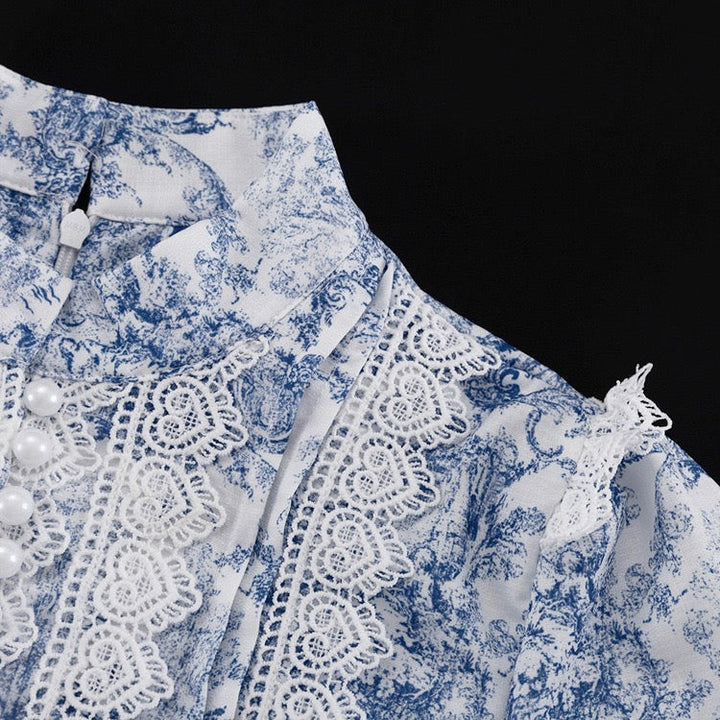 Mini dress with illustrated embellishments, embroidery, and pearl buttons – Alexandra