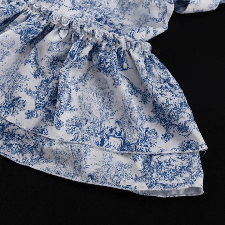 Mini dress with illustrated embellishments, embroidery, and pearl buttons – Alexandra