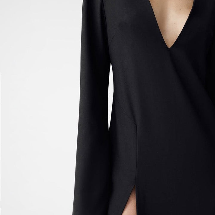 Tailored maxi dress with deep V-neckline and slit design - Amber