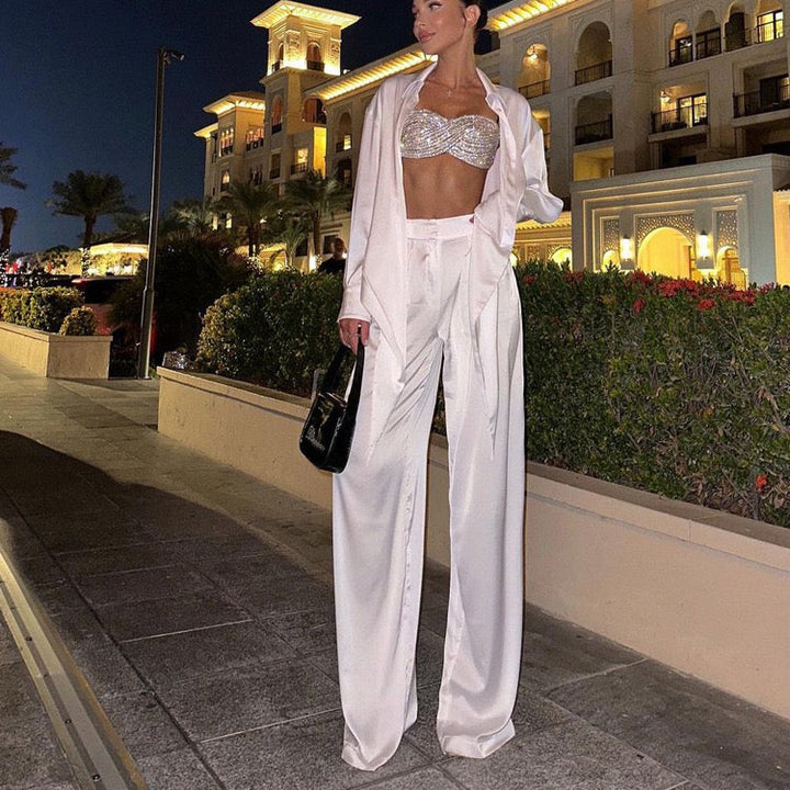 Two-piece satin suit with tie top and long pants – Ava
