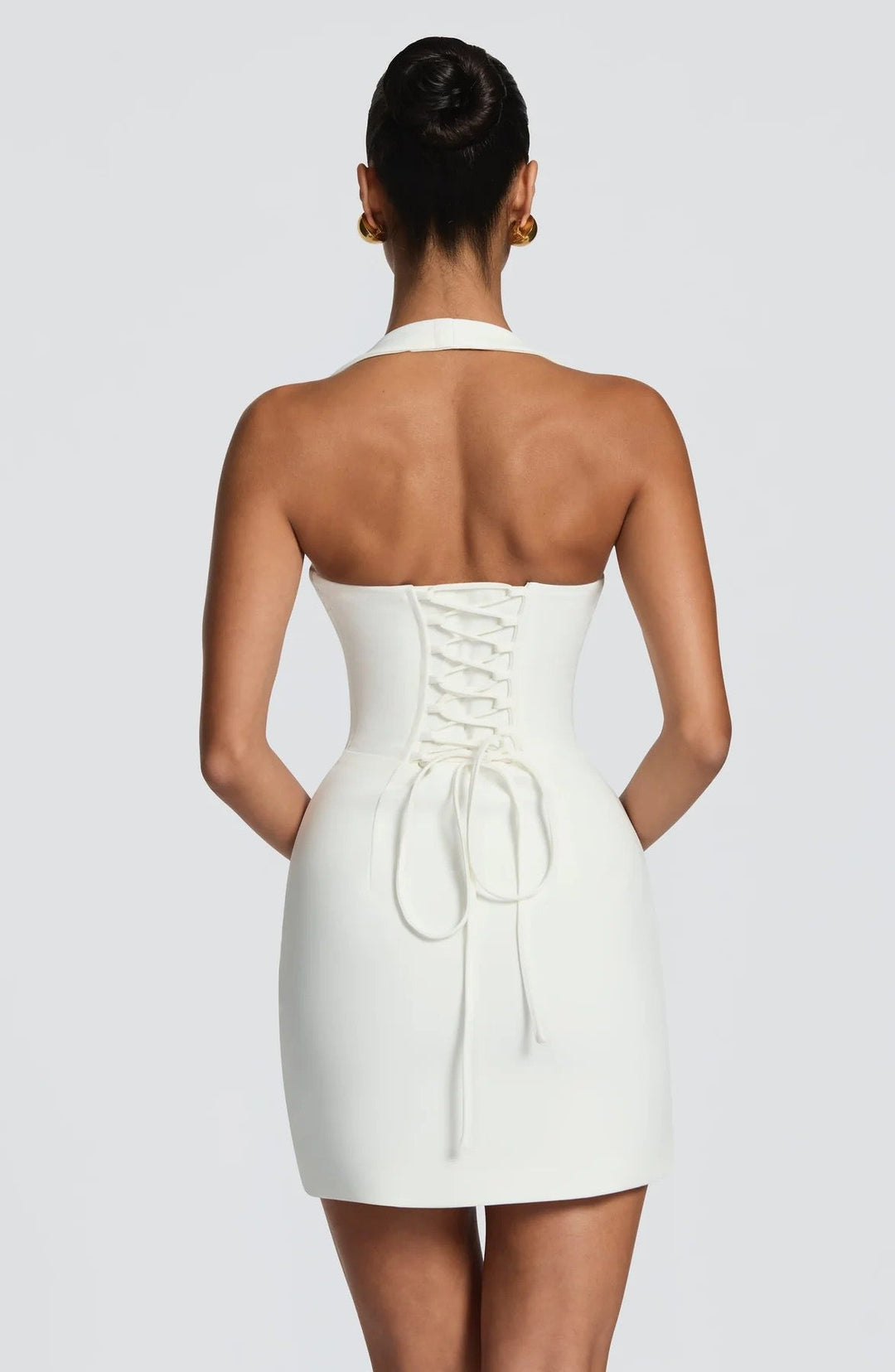 Fitted mini dress in shaping fabric with open-back design – Amor