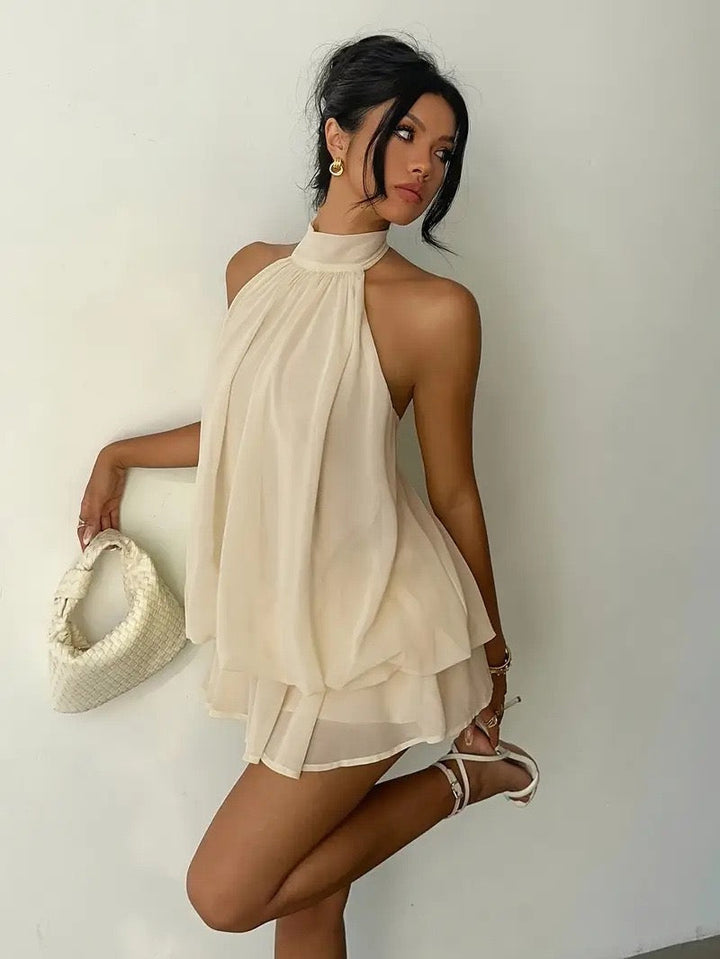 Chiffon ruffled mini dress with tiered ruffles, neck tie, and open back – Seychelles