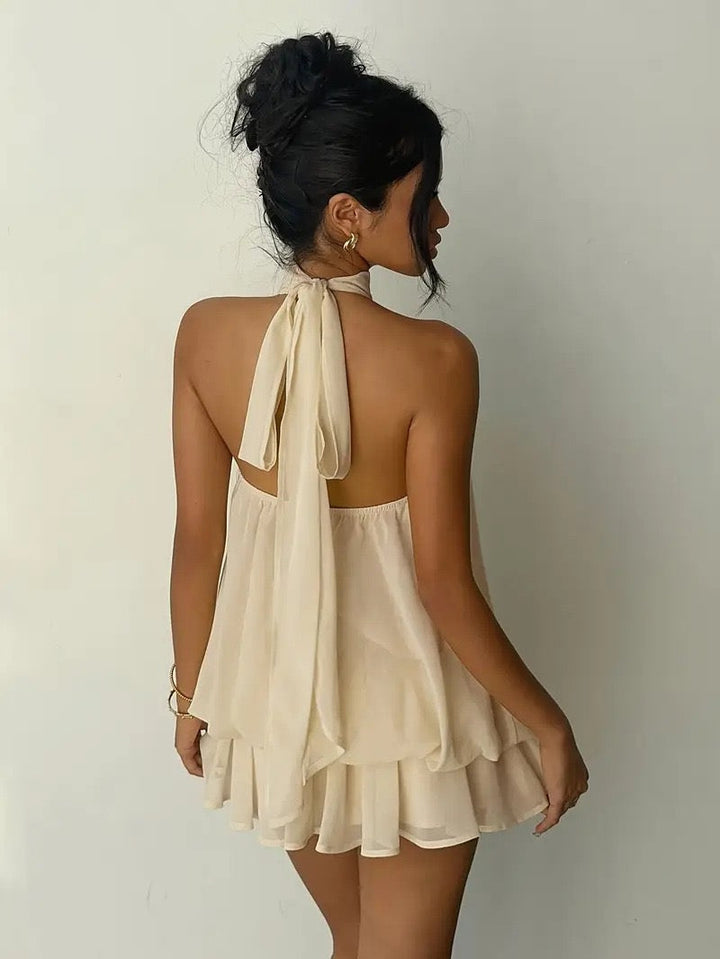 Chiffon ruffled mini dress with tiered ruffles, neck tie, and open back – Seychelles