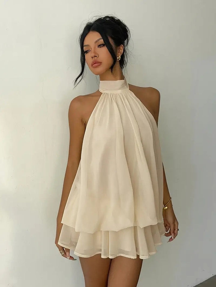 Chiffon ruffled mini dress with tiered ruffles, neck tie, and open back – Seychelles