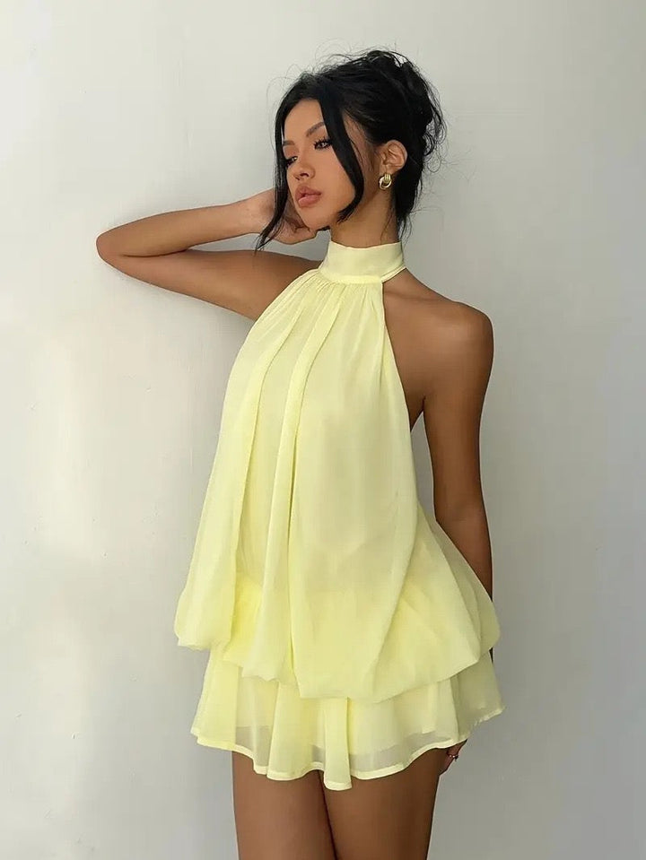 Chiffon ruffled mini dress with tiered ruffles, neck tie, and open back – Seychelles