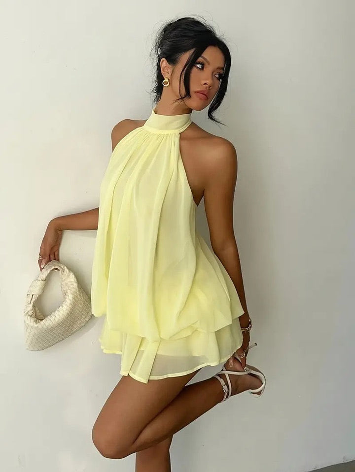Chiffon ruffled mini dress with tiered ruffles, neck tie, and open back – Seychelles
