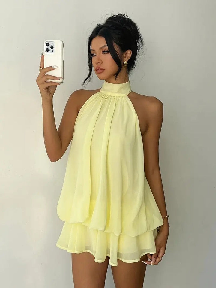 Chiffon ruffled mini dress with tiered ruffles, neck tie, and open back – Seychelles