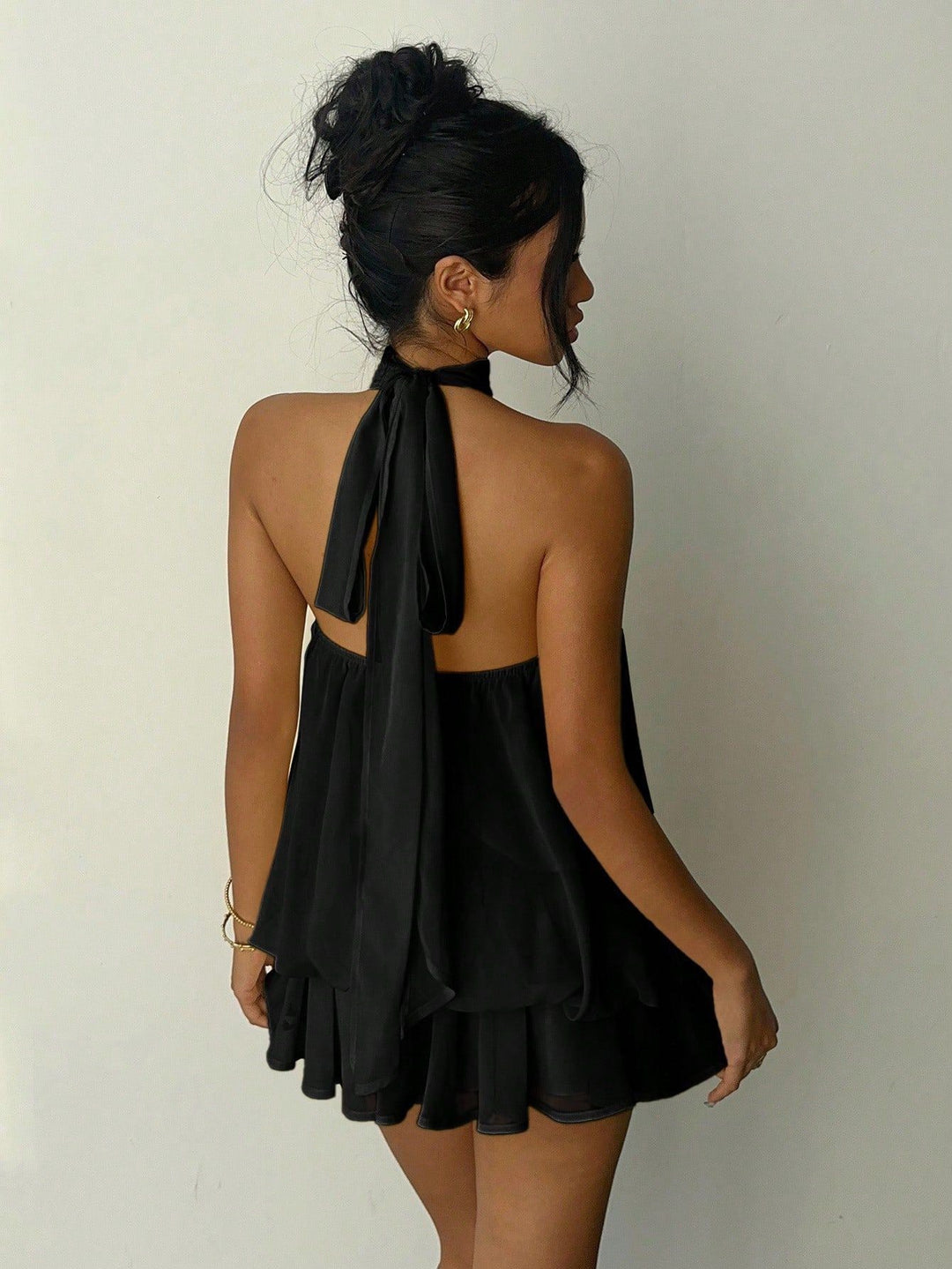 Chiffon ruffled mini dress with tiered ruffles, neck tie, and open back – Seychelles